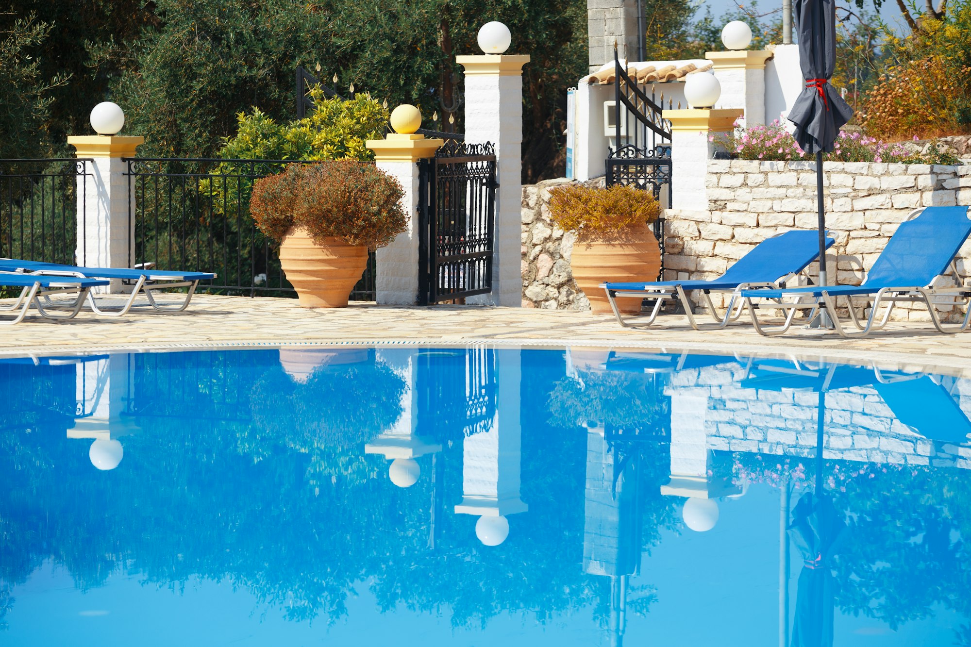swimming pool at sunny hotel